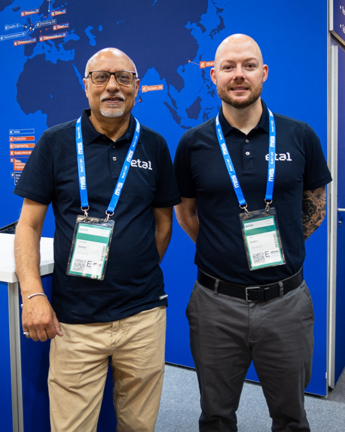 A picture of Kamlesh Vadhia and Alex Deakin, working in sales.